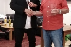 Steve Colesby Presents A Glass Plaque Award From The Lads
